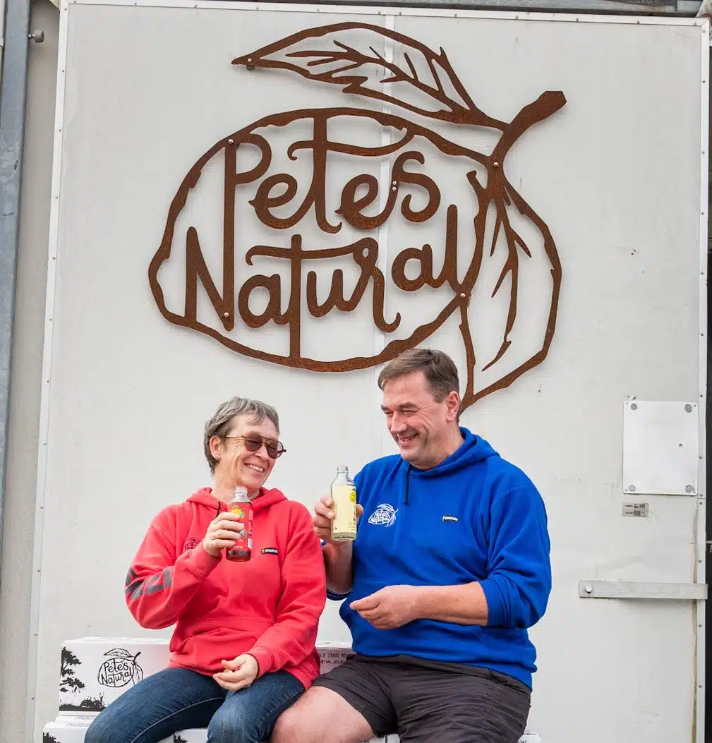 A sunlit orchard in New Zealand representing local, sustainable fruit sourcing